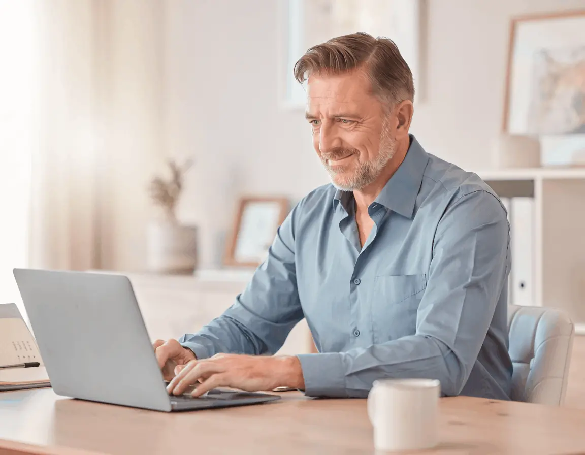 Man working productively and focused at his desk